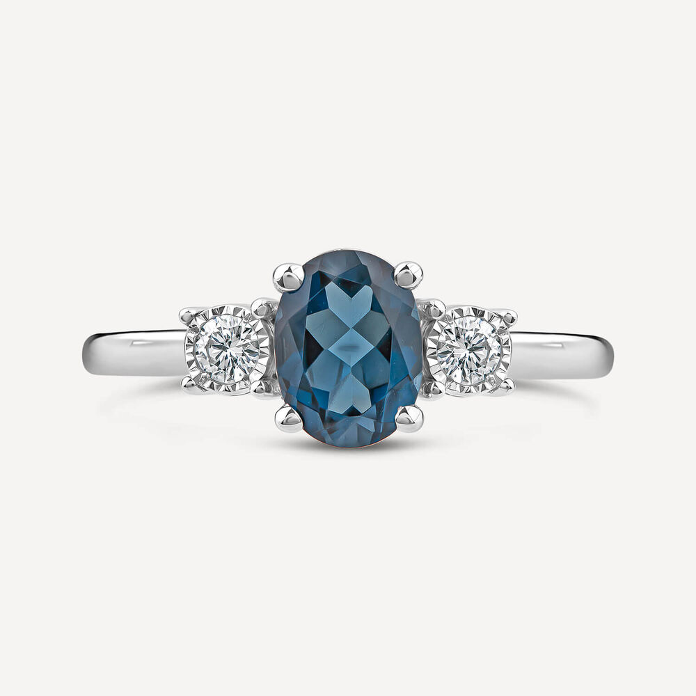 9ct White Gold Oval Blue Topaz & 0.15ct Diamond Sides Ring